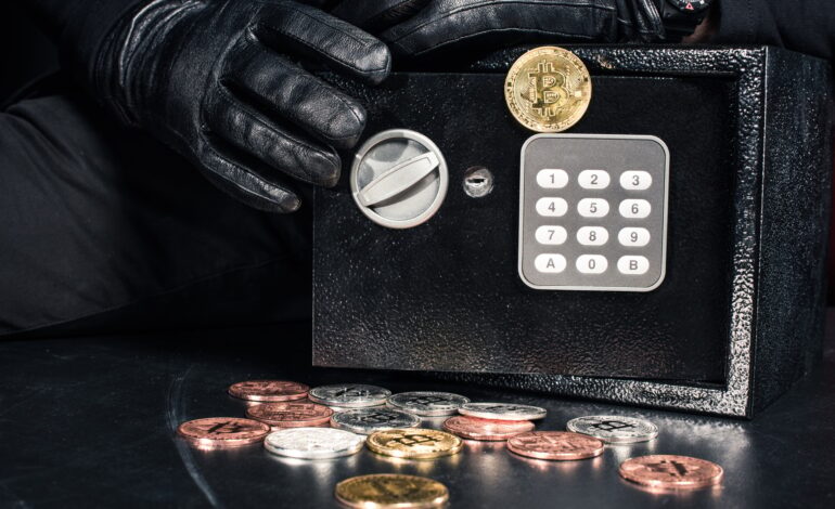 Close-up view of man opening safe with bitcoin cryptocurrency