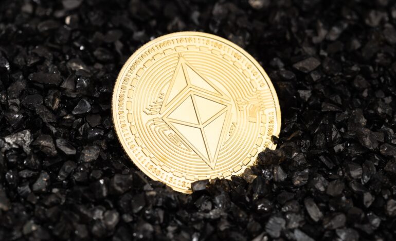 Ethereum classic coin on black gravel background