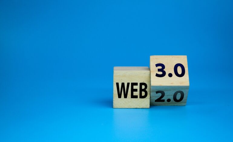wooden cube with the words web 3.0 or 2.0.
