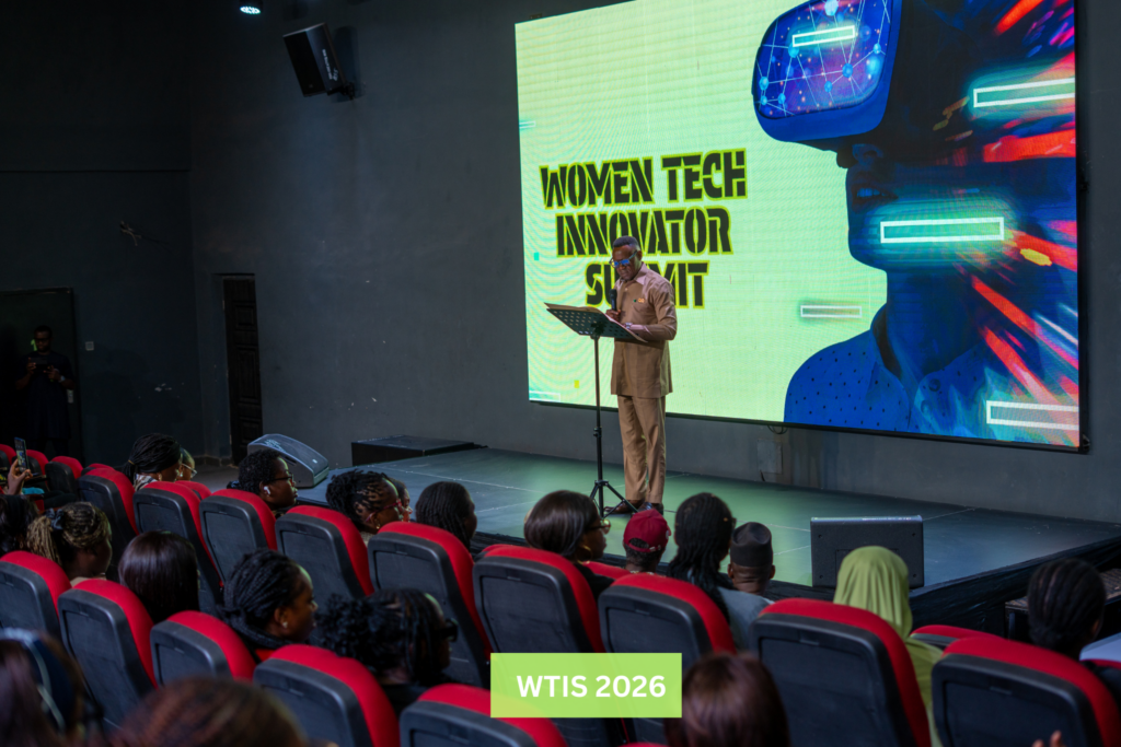 Hon Etin-Osa Ogbeiwi speaking on stage